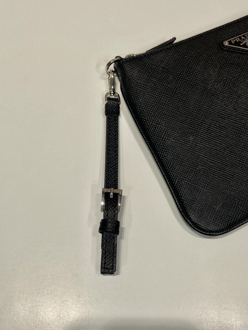 Pra*a clutch bags